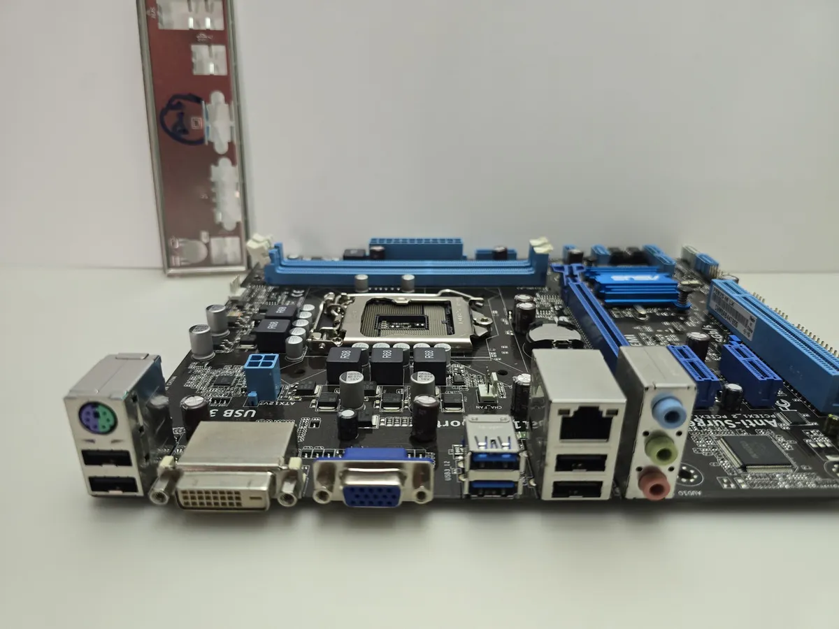 Материнська плата ASUS P8B75-M LX (LGA 1155, DDR3, б/в)