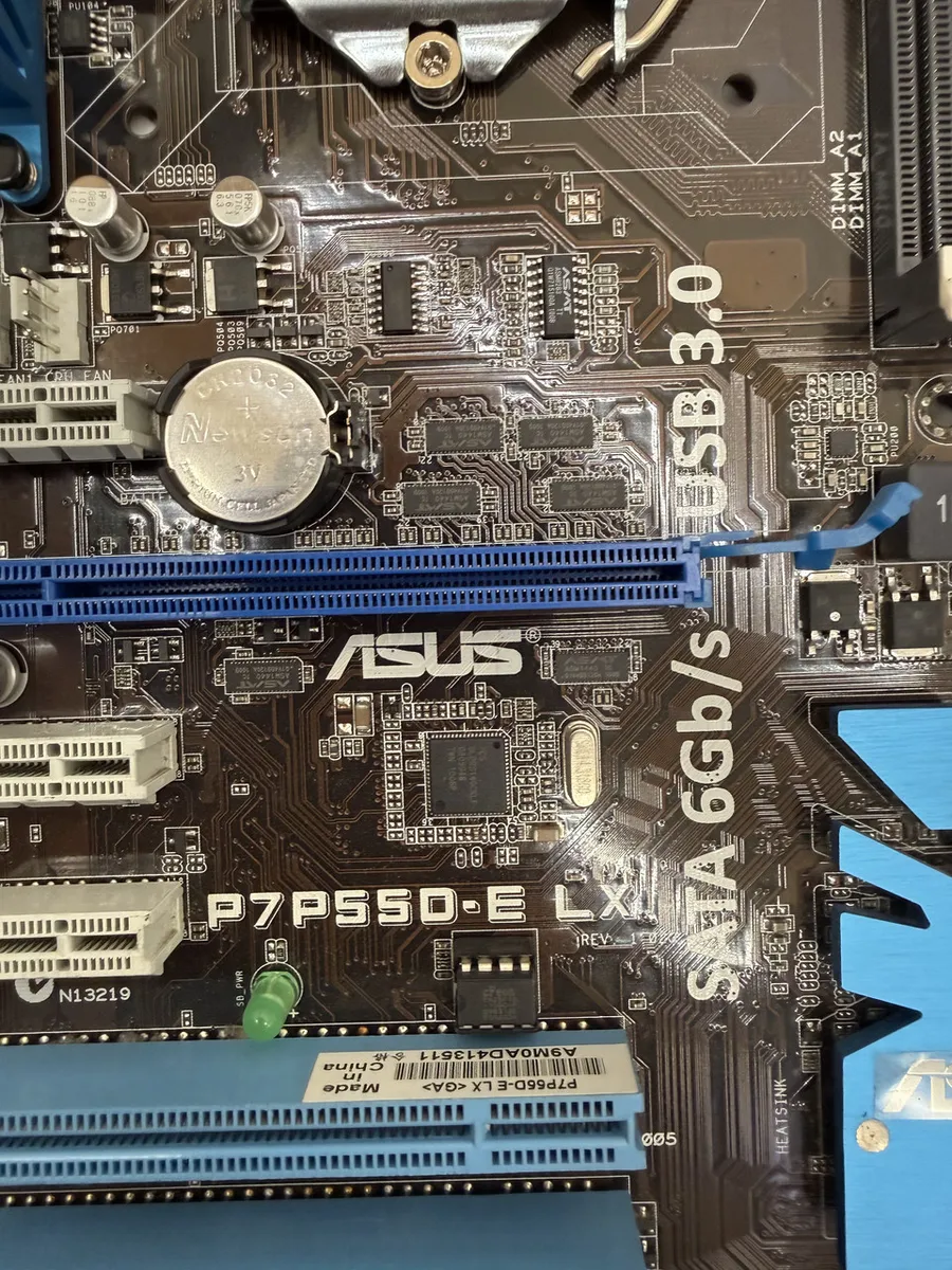 Материнська плата ASUS P7P55D-E LX (LGA 1156, DDR3, б/в)