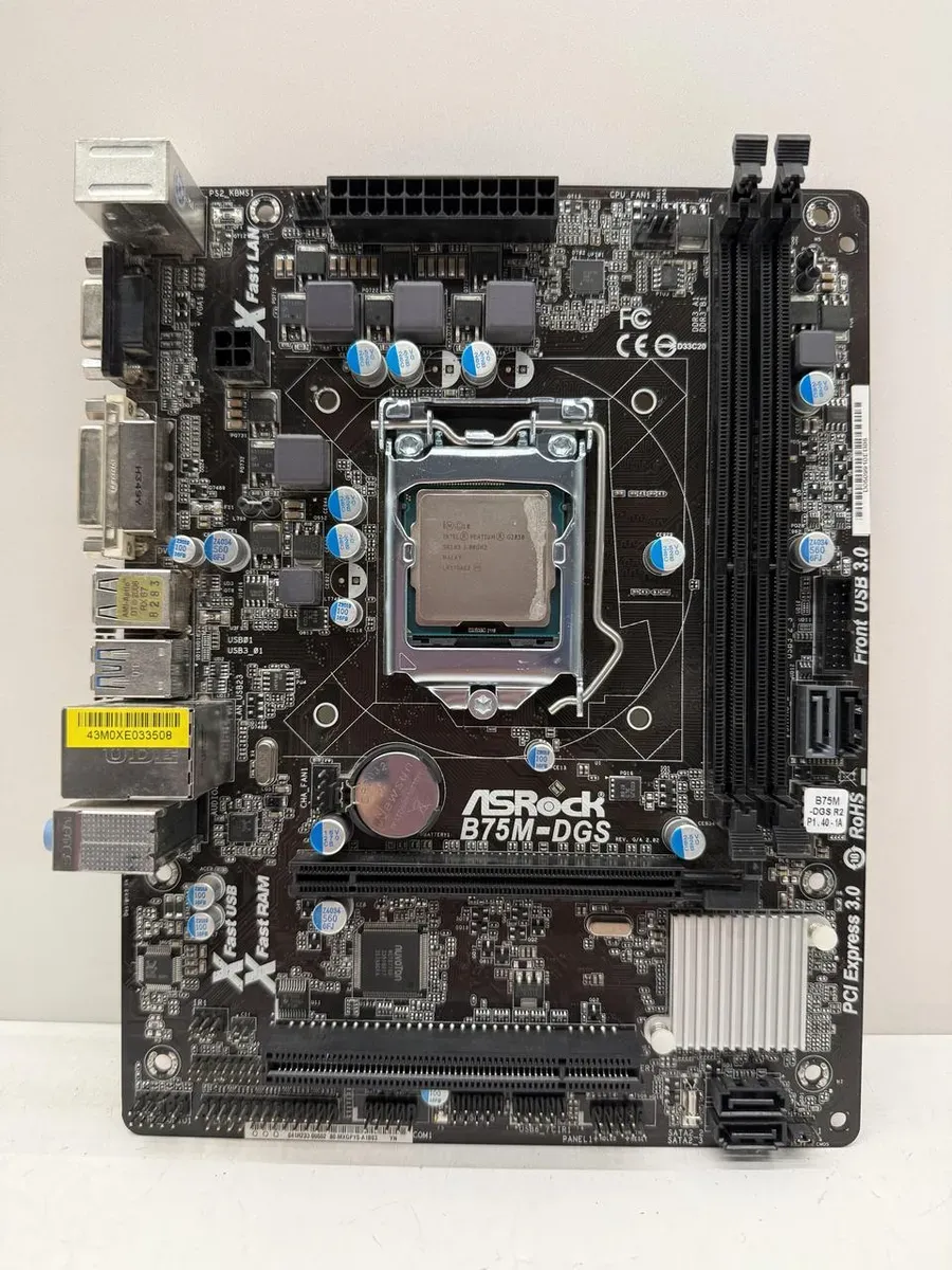 Материнська плата ASRock B75M-DGS (LGA 1155, DDR3, б/в)
