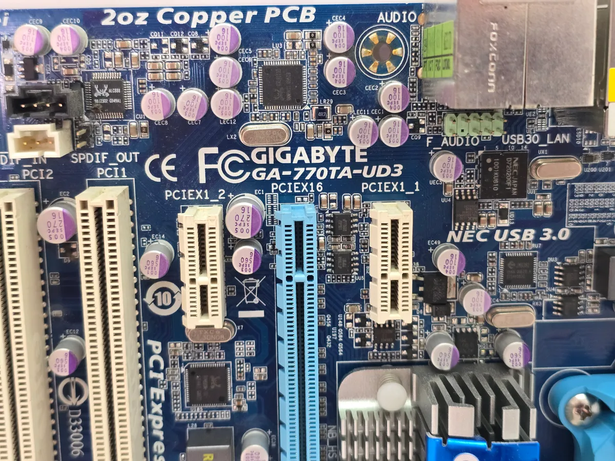 Материнська плата Gigabyte GA-MA770TA-UD3 (Socket AM3, DDR3, б/у) купити в Україні