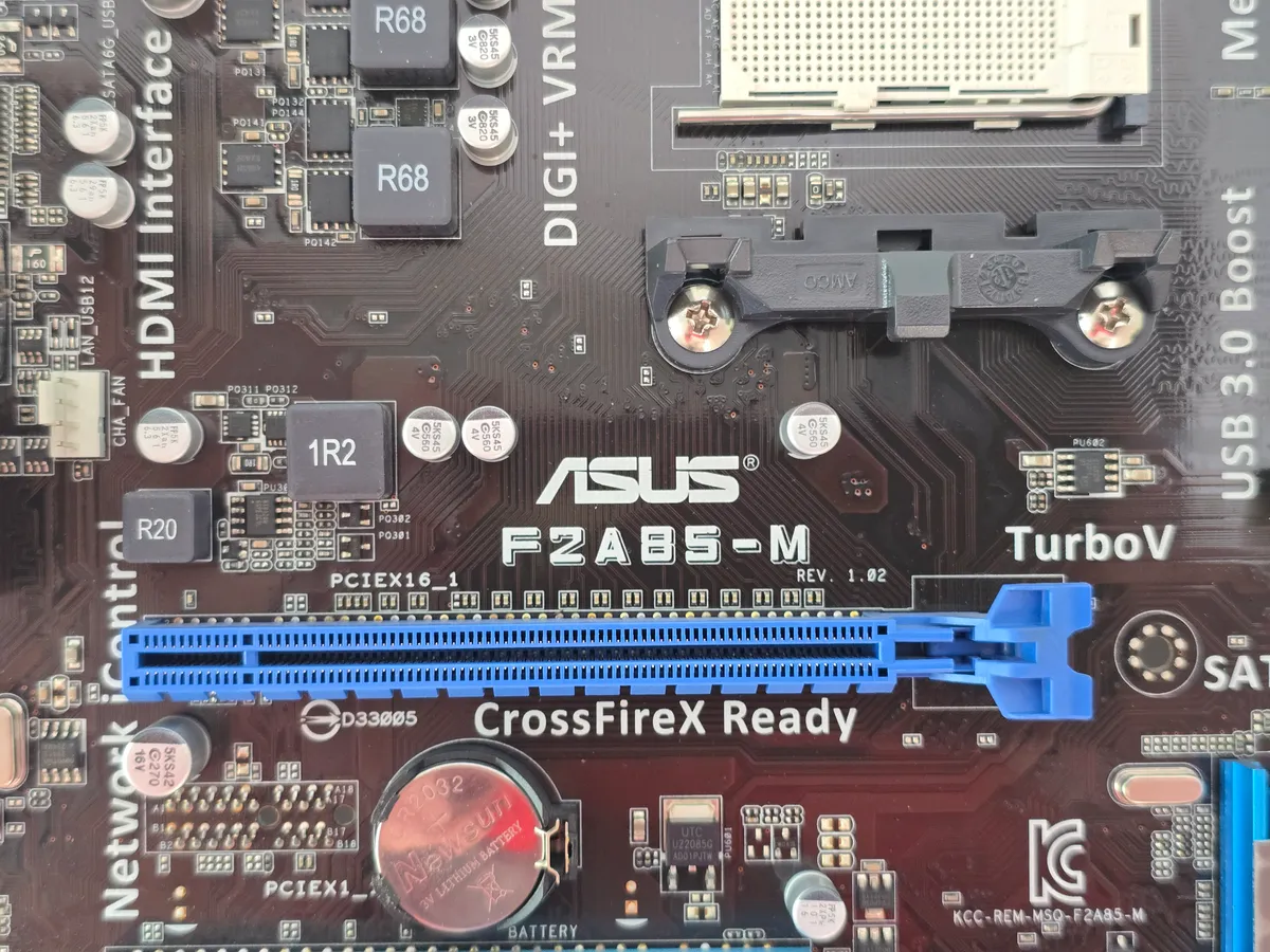 Материнська плата ASUS F2A85-M (Socket FM2, DDR3, б/у) купити в Україні