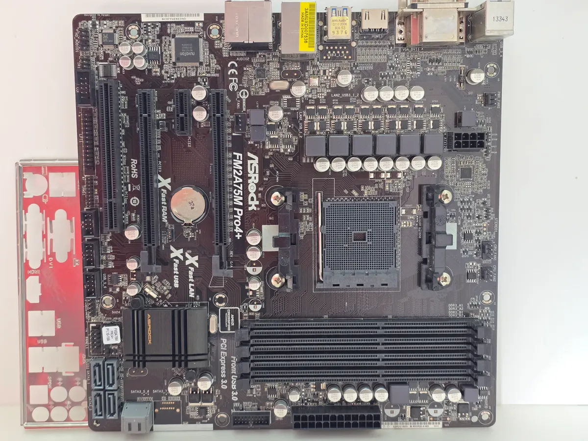 Материнська плата ASRock FM2A75M-Pro4+ (Socket FM2+, DDR3, б/у) купити в Україні