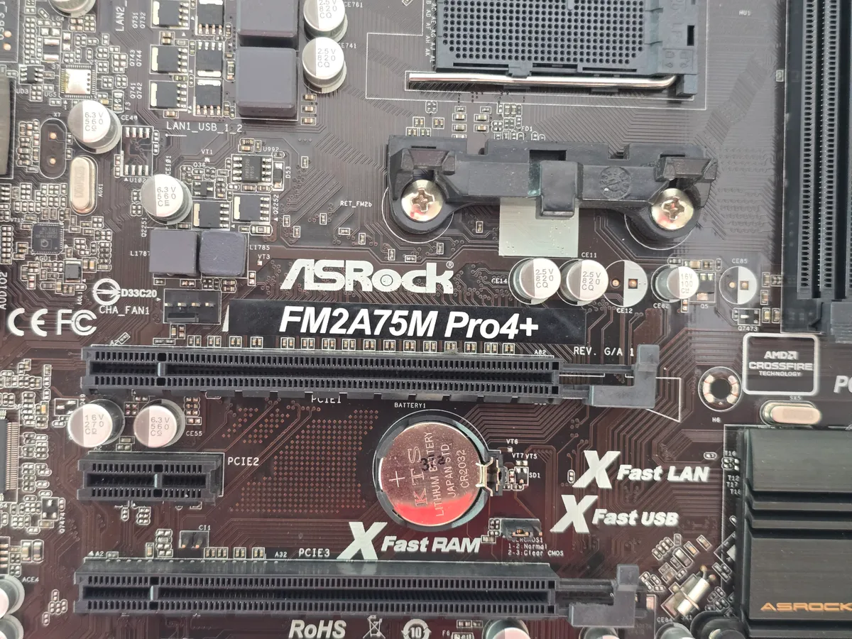 Материнська плата ASRock FM2A75M-Pro4+ (Socket FM2+, DDR3, б/у) купити в Україні