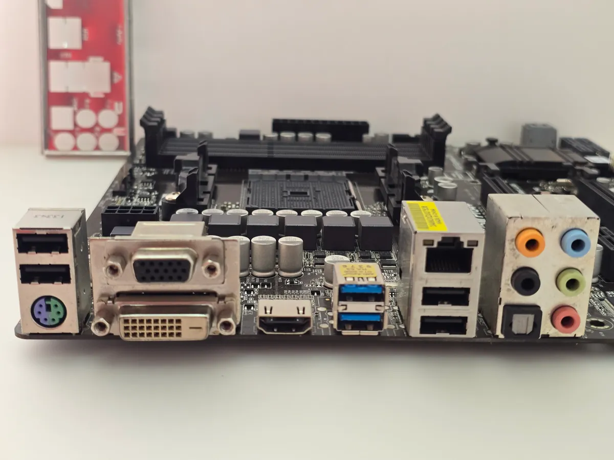 Материнська плата ASRock FM2A75M-Pro4+ (Socket FM2+, DDR3, б/у) купити в Україні