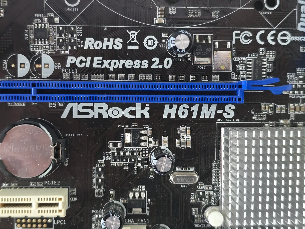 Материнська плата ASRock H61M-S Socket 1155 | Гарантія якості від KOMPi
